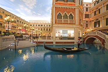 Shops and canal with gondola at Venetian Casino Resort, Macao, Taipa, China, Asia