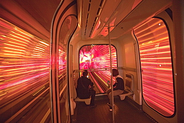 Tourists driving through a tunnel between Bund and Pudong, Shanghai, China, Asia