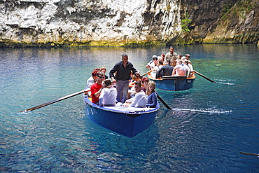 Cephalonia, tourists driving in boats in front of Melissani cave in Sami, Ionian Islands, Greece