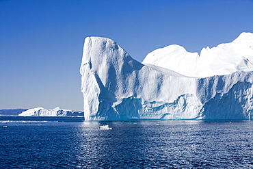 Icebergs of Ilulissat Kangerlua Isfjord in the sunlight, Disko bay, Kitaa, Greenland