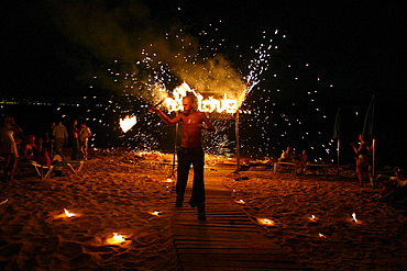 Jugglers and fire-eaters at CafÃˆ del Mar Ibiza, Balearic Island, Spain