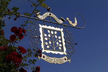 Hotel zur Linde, wrought iron sign, island of Frauenchiemsee, Lake Chiemsee, Bavaria, Germany