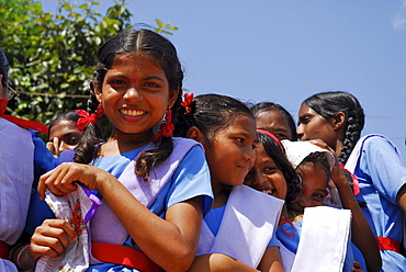 Girls wearing school uniforms in the sunlight, Bastar, Chhattisgarh, India, Asia