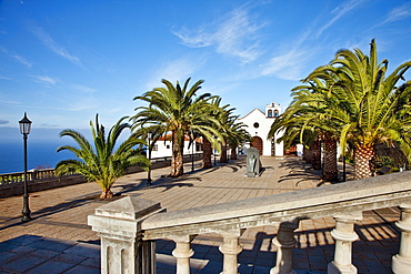 Church behind palm trees in the sunlight, Santo Domingo de Garafia, La Palma, Canary Islands, Spain, Europe