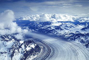 Aerial view of Tokositna Glacier under clouded sky, Alaska Range, Alaska, USA, United States of America