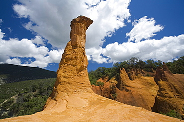 Colorado Provencal, rocks of ochre under a blue sky, Rustrel, Vaucluse, Provence, France