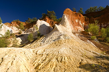 Colorado Provencal, rocks of ochre under a blue sky, Rustrel, Vaucluse, Provence, France