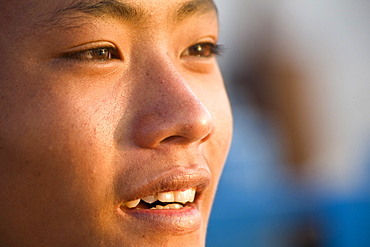 Face of a burmese boy of the Intha tribe at Inle Lake, Shan State, Myanmar, Burma