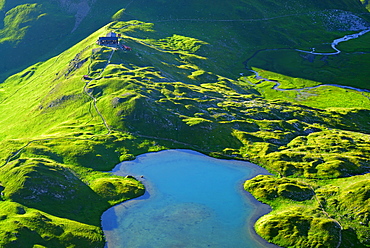 lake unterer Seewisee with hut Memminger Huette, Lechtal range, Tyrol, Austria