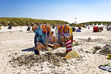 Children building Sandcastle, Norddorf, Amrum, Island, North Frisian Islands, Schleswig-Holstein, Germany