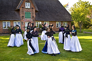 Dancing Group in traditional Costumes, Nebel, Amrum Island, North Frisian Islands, Schleswig-Holstein, Germany