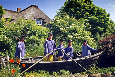 Sculpture of sailors in a garden at Morsum, Sylt island, North Friesland, Schleswig-Holstein, Germany