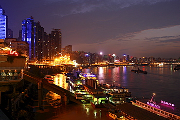 River Cruisers in front of the skyline, Chongqing, China, Asia