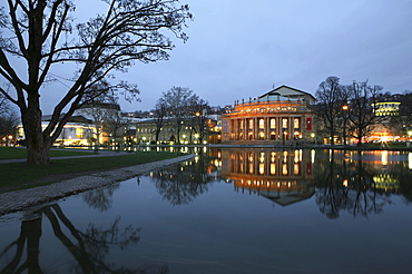 View over Lake Eckensee to the Opera House at Oberer Schlossgarten at night, Stuttgart, Baden-Wurttemberg, Germany