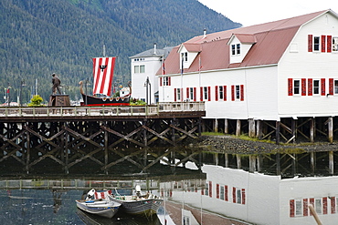 A house on piles and boats at the lake, Petersburg, Inside Passage, Alaska, USA