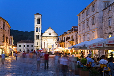 People at sidewalk cafes in the Old Town in the evening, Hvar, Hvar Island, Dalmatia, Croatia, Europe