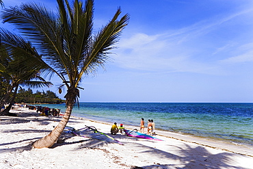 Tourists relaxing at Shanzu Beach, Coast, Kenya