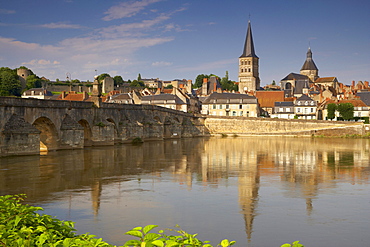 Old town of La-CharitâˆšÃ‰Â¬Â©-sur-Loire, stone bridge over the Loire river, Church and former monastery Notre Dame in the background, The Way of St. James, Chemins de Saint Jacques, Via Lemovicensis, La-CharitâˆšÃ‰Â¬Â©-sur-Loire, Dept. Nievre, Burgundy, France, Europe