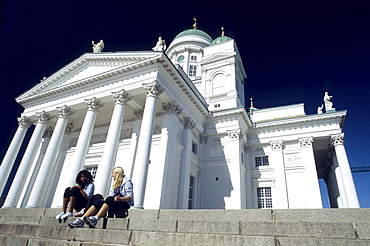 People sitting on the stairs in front of the cathedral, Helsinki, Finland, Europe