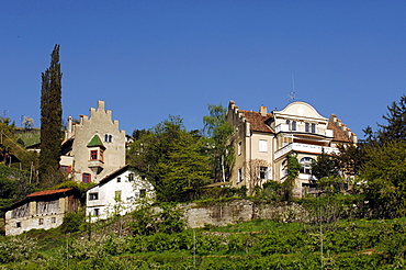 Residential houses under blue sky, Merano, Val Venosta, South Tyrol, Italy, Europe