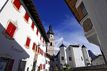 Church and parish hall in the sunlight, Kastelruth, South Tyrol, Italy, Europe