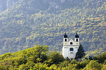 View at Gleif church in front of forested mountain, Eppan an der Weinstrasse, Bolzano, South Tyrol, Italy, Europe, Europe