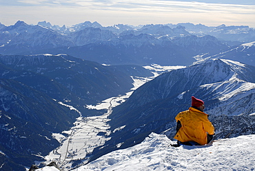 Man enjoying the views into the valley, Antholz valley, Puster valley, South Tyrol, Italy