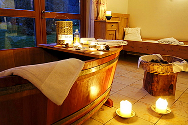 Wooden bathtub and candles at the spa of Hotel Bad Schoergau, Bad Schoergau, Valley Sarntal, South Tyrol, Italy, Europe