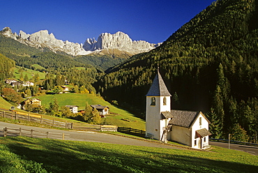 San Cipriano chapel, view to Cima Catinaccio, Dolomite Alps, South Tyrol, Italy