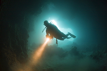 Diver at Entrance of Chandelier Dripstone Cave, Micronesia, Palau