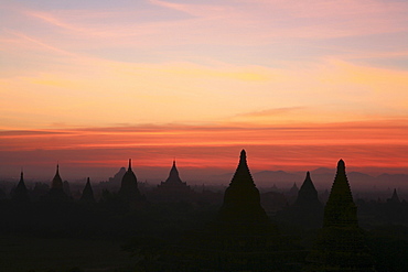 Sunrise over temple towers at the plain of Bagan, Myanmar, Burma, Asia