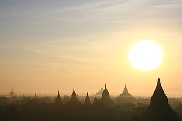 Temple towers at the plain of Bagan at sunrise, Bagan, Myanmar, Burma, Asia