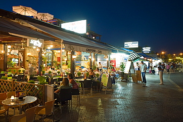 Restaurant, cafe along the harbour promenade at night, Paphos, South Cyprus, Cyprus