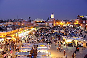 Illuminated snack stalls at the Place Jemaa el-Fna in the evening, Marrakesh, South Morocco, Morocco, Africa