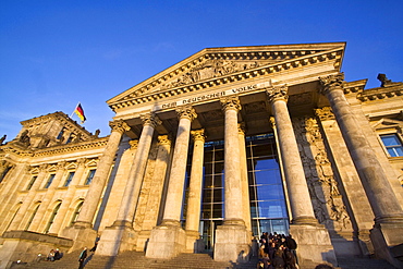 Reichstag building, columns at the entrance, people queeing, outdoors, Berlin