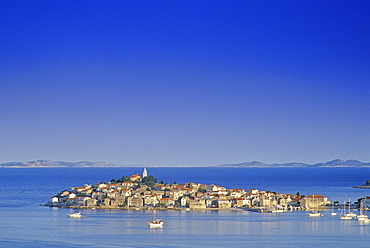 View at fishing village Primosten under blue sky, Croatian Adriatic Sea, Dalmatia, Croatia, Europe