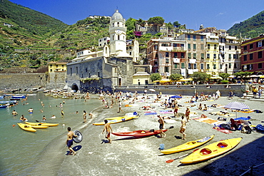 People on the beach in the sunlight, Vernazza, Cinque Terre, Liguria, Italian Riviera, Italy, Europe