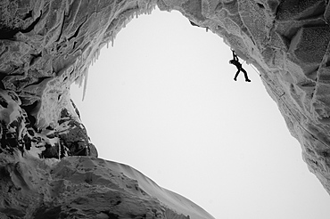 Man ice climbing at a glacier, Tyrol, Austria, Europe