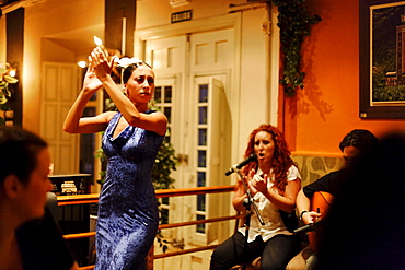 Woman dancing flamenco in the flamenco restaurant Vino Mio, Malaga, Andalusia, Spain