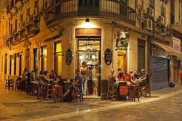 Guests in a bar, Old Town, Malaga, Andalusia, Spain