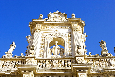 Decorated facade over the entrance to the cathedral, Lecce, Puglia, Italy