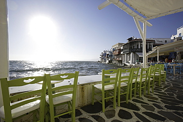 Terrace on the waterfront in the sunlight, Little Venice, Mykonos Town, Greece, Europe