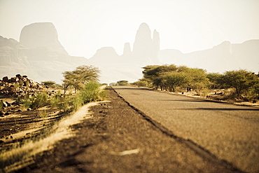 Empty road in the sunlight in front of Hand of Fatima, Mali, Africa