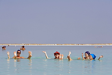 Women and girls floating in the Dead Sea, En Bokek, Israel, Middle East