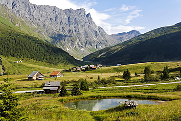 Hamlet Radons in Val Nandro, Piz Forbesch and Wissberg in background, Grisons, Switzerland