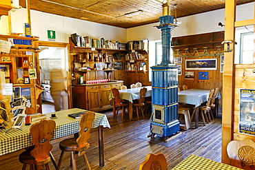 The restaurant and lounge in Rifugio Citta di Chivasso, mountain hut at Col de Nivolet, border between Piedmont and Aosta, Gran Paradiso National Park, Italy