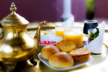 Moroccan breakfast with peppermint tea and orange juice, Riad Kaiss, Marrakech, Morocco, Africa