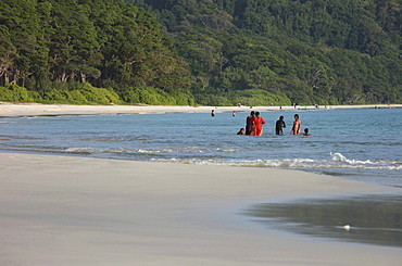 Local girls wearing saris at Radha Nagar Beach, Beach 7, Havelock Island, Andamans, India