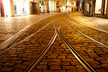 Tram lines in the Old Town of Ghent at night, Flanders, Belgium