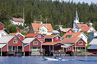 Village Ulvoen on the waterfront, Hoega Kusten, Vaesternorrland, Sweden, Europe